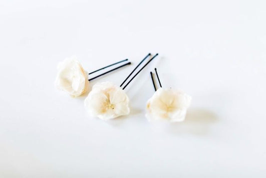 Pics à cheveux fleuris